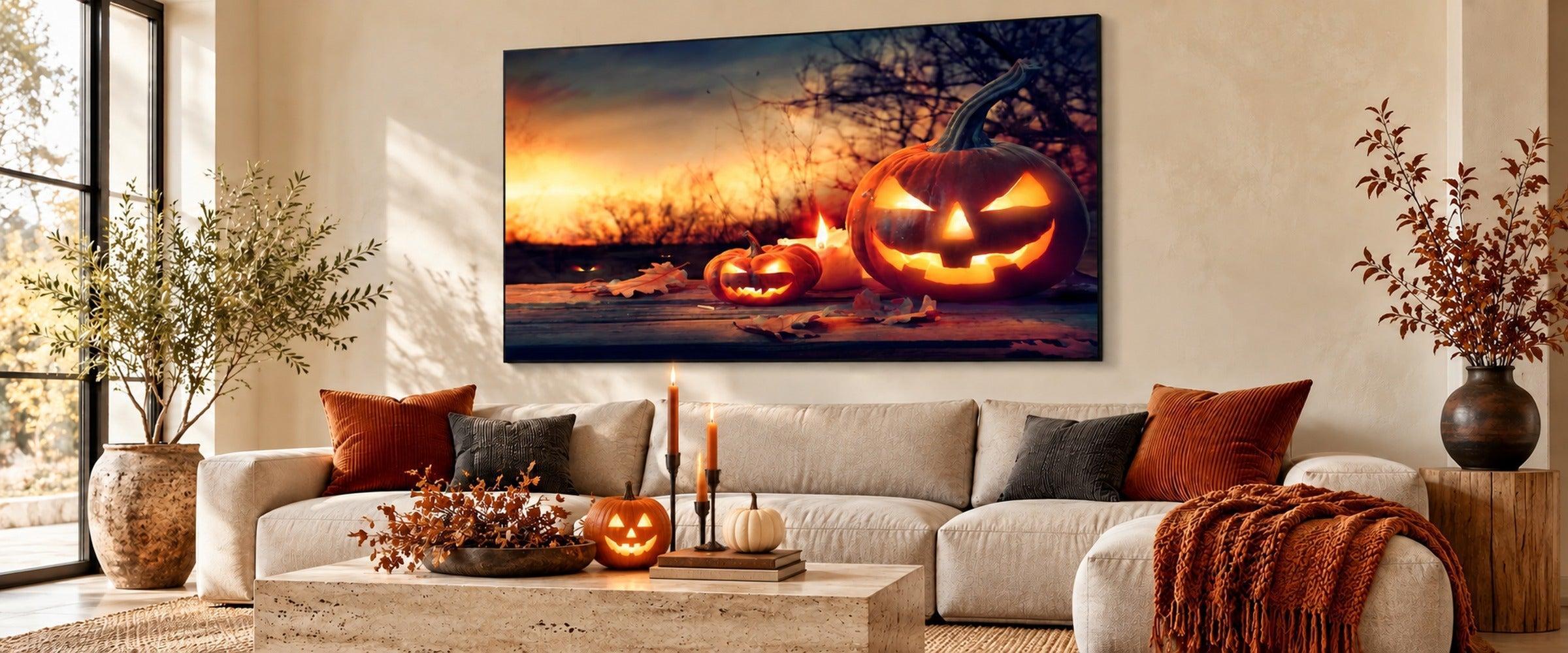Large Halloween sunset artwork above linen sofa
